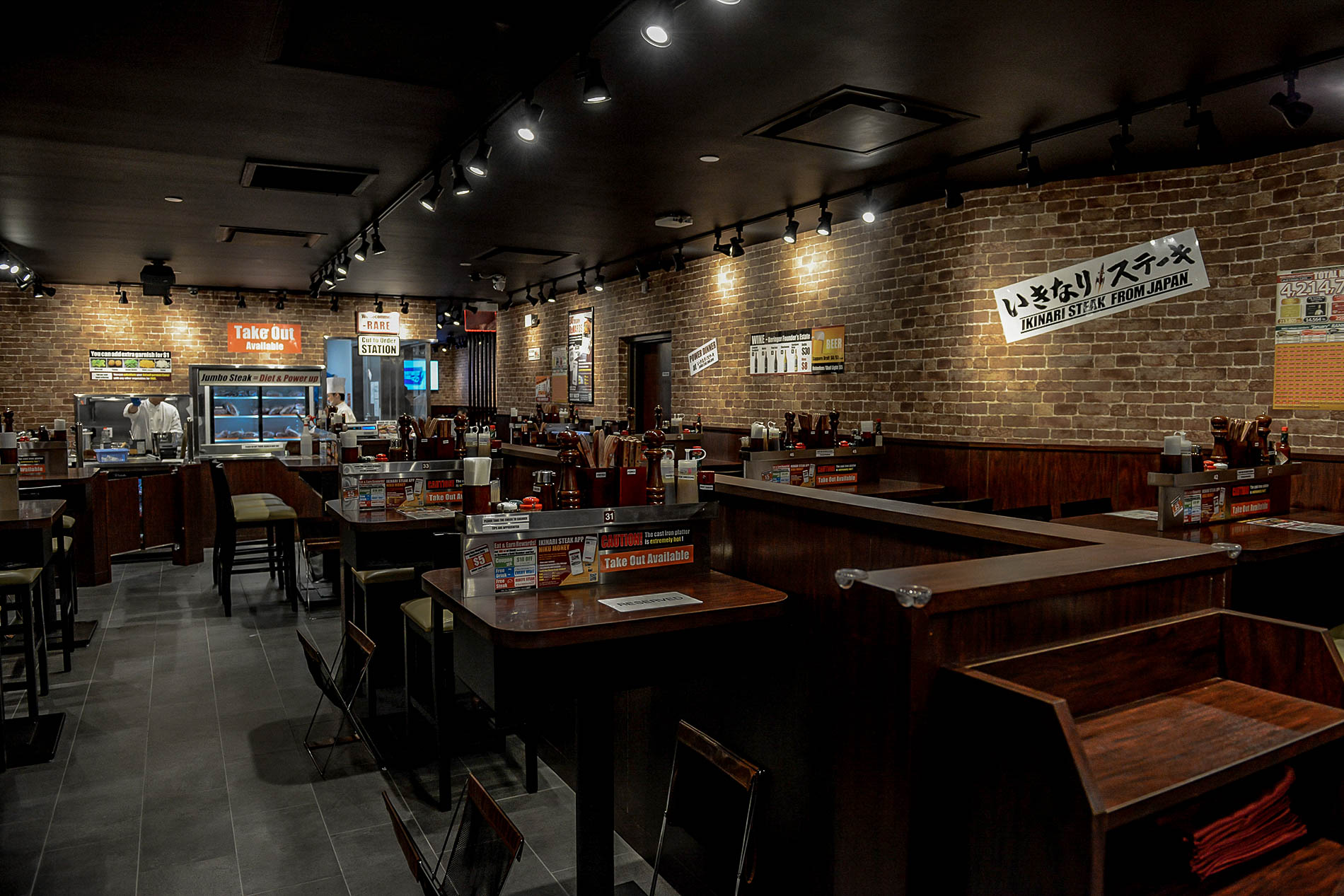 Interior view of an Inkinari Steak restaurant. 