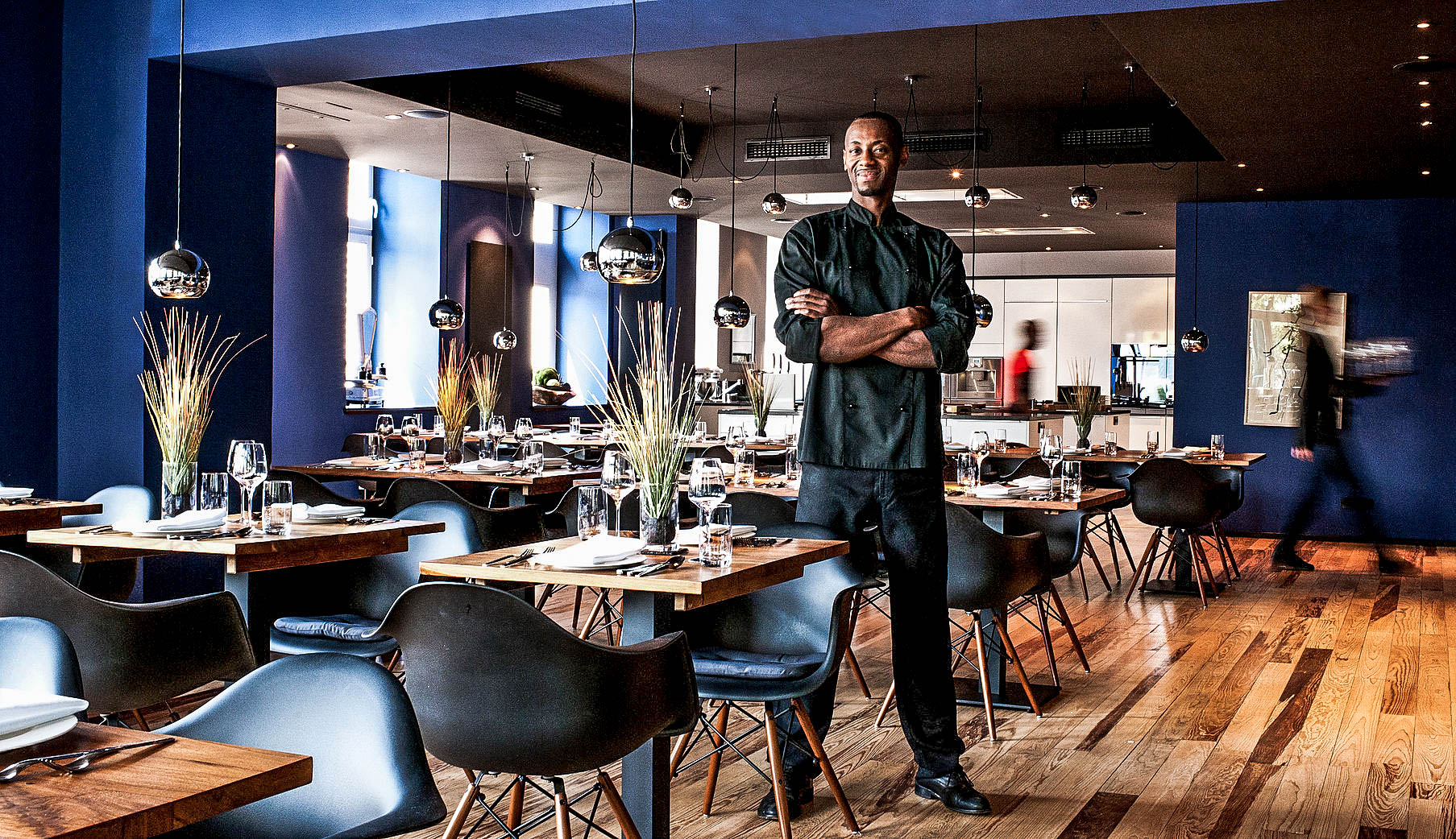 Chef Anthony Sarpong abostanding in his restaurant Anthony's kitchen