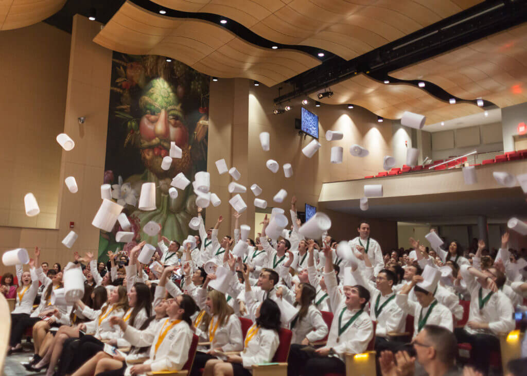Chefs celebrating their graduation at a Culinary School