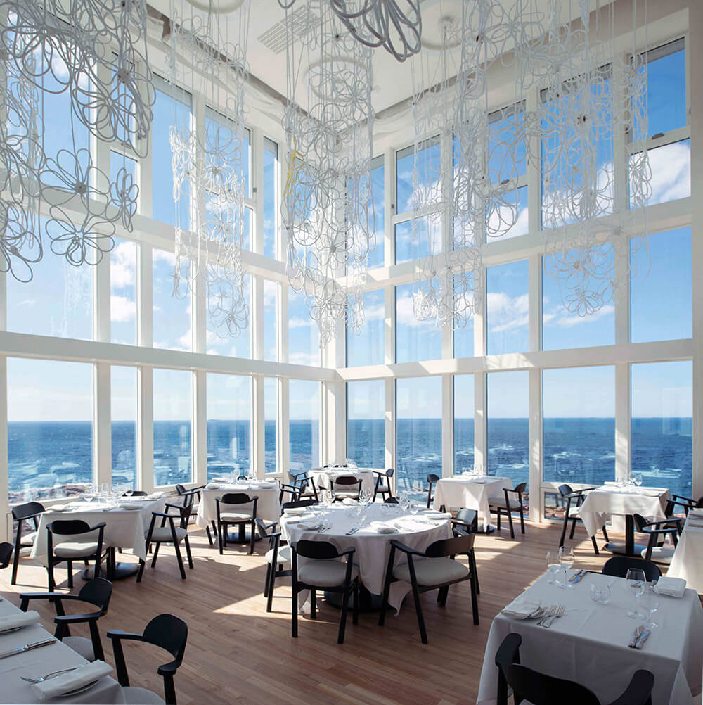 Interior of the hotel Fogo Island Inn with a beautiful view on the water