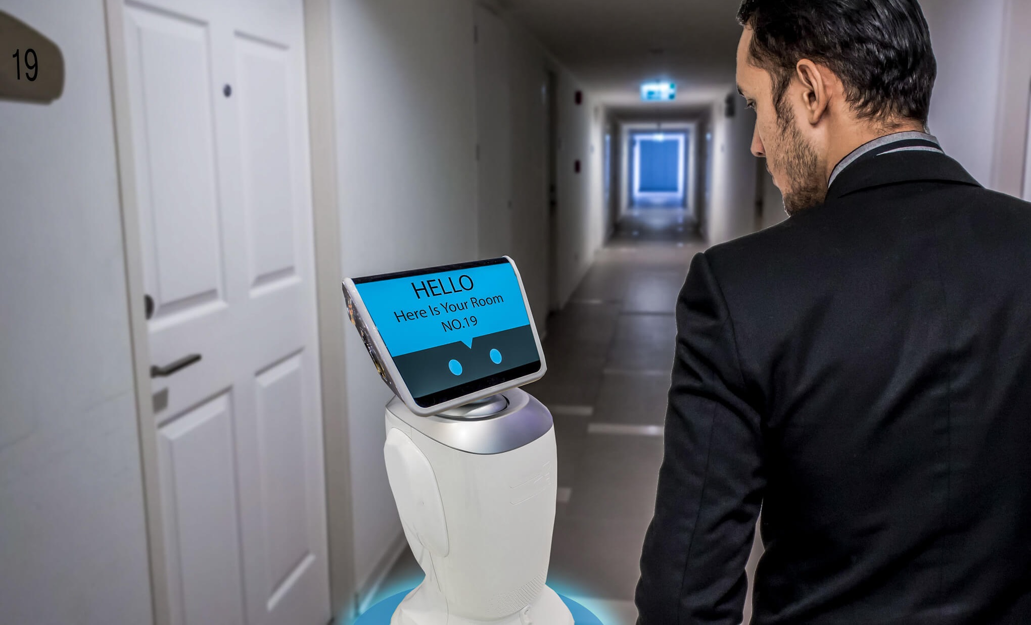 A robot takes the guest to their room