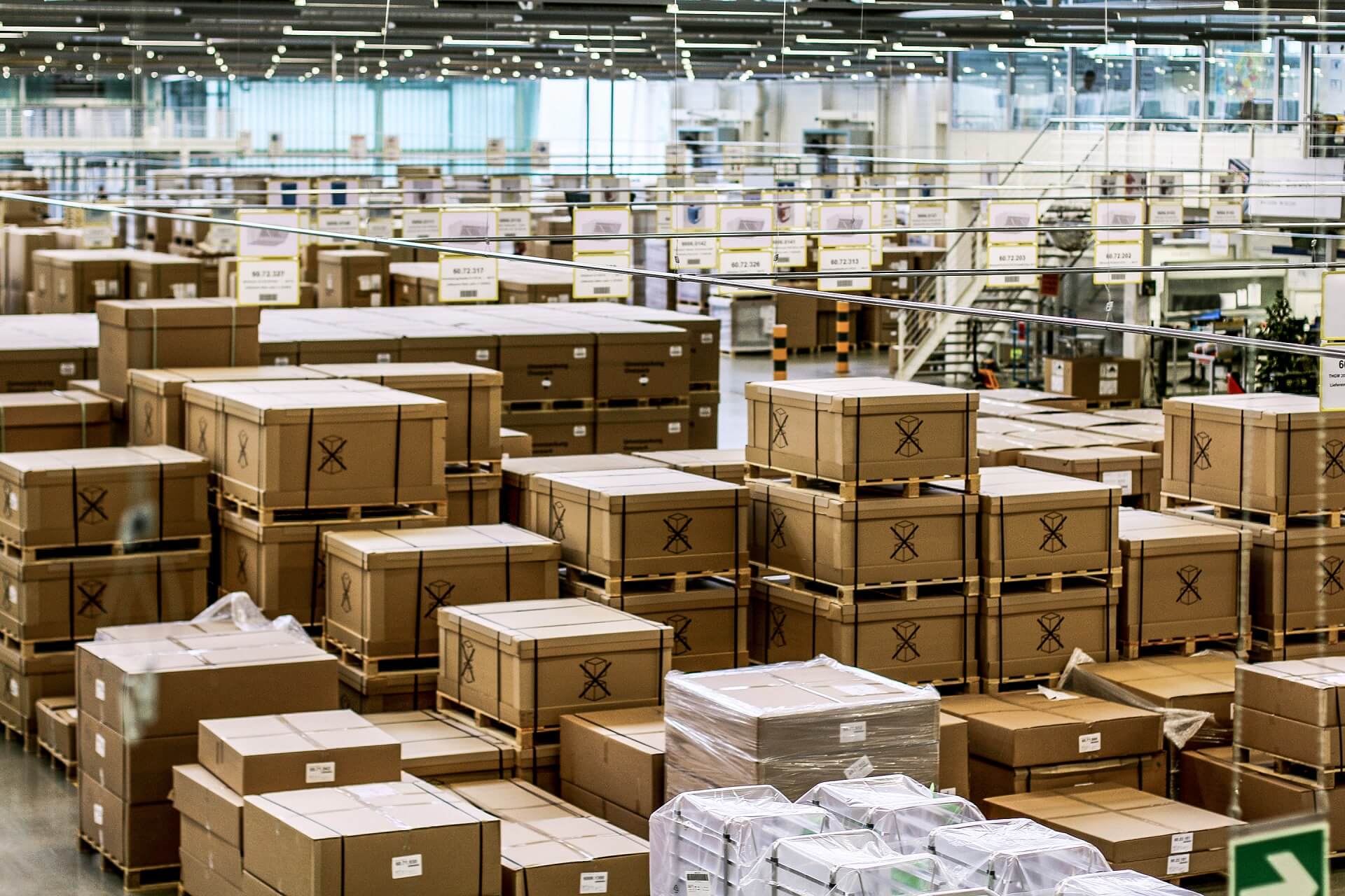 Packages pile up in shipping hall due to lacks of delivery capability for components 
