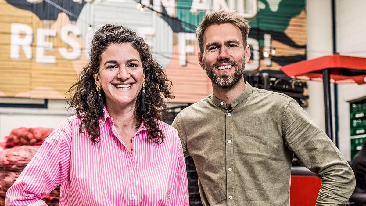 Instock founders Selma Seddik and Bart Roetert in the stockroom of their wholesale grocery store
