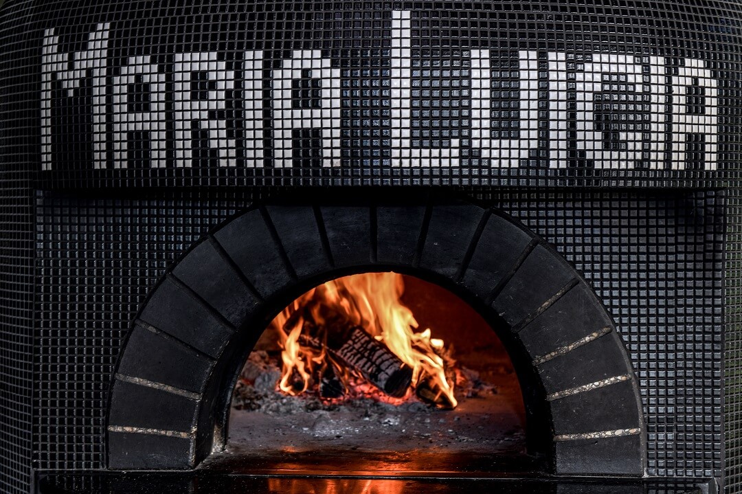Jessica Rosval enjoys cooking with open fire at Maria Luicia.