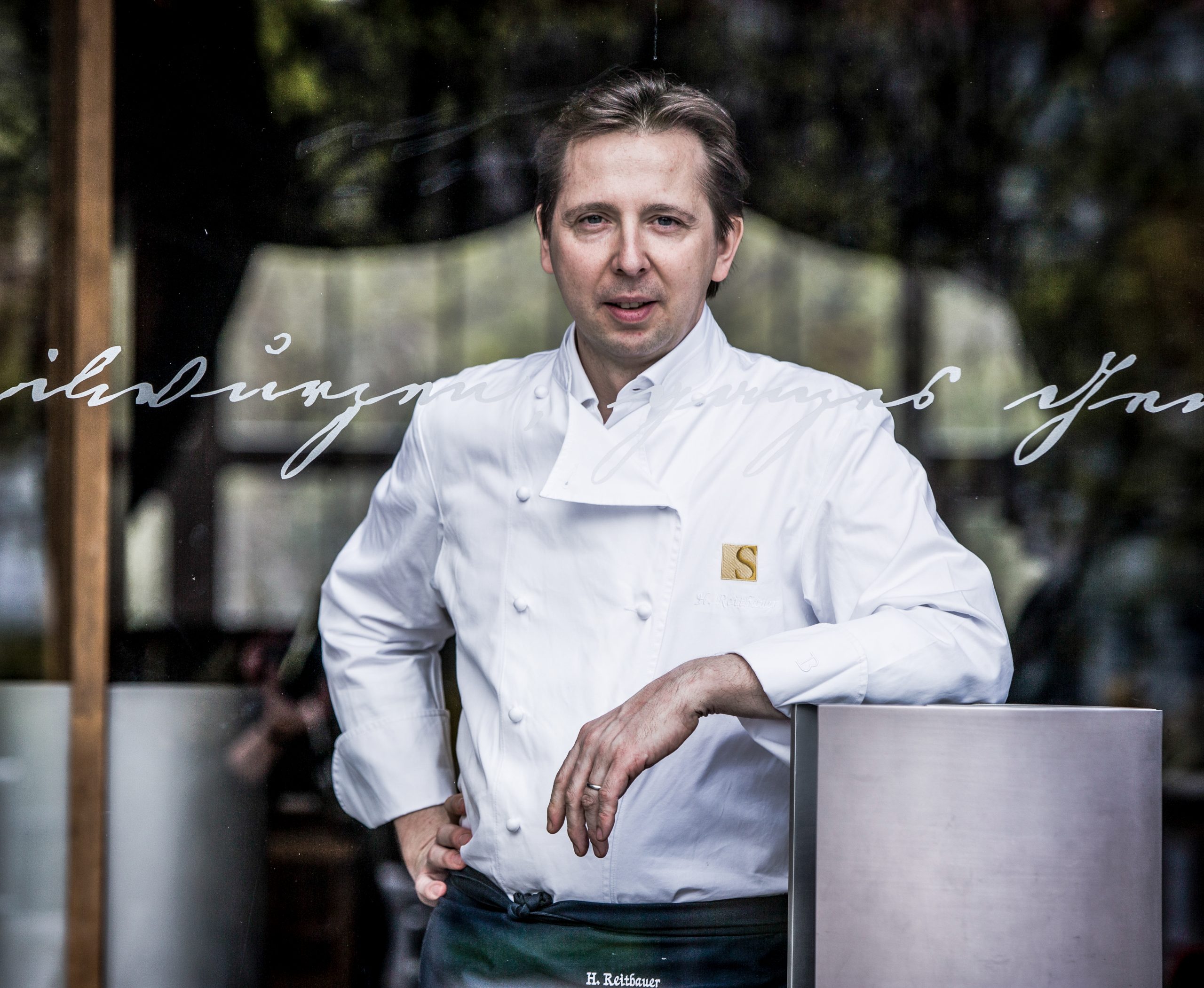 Heinz Reitbauer in front of his Michelin-starred Restaurant the Steirereck