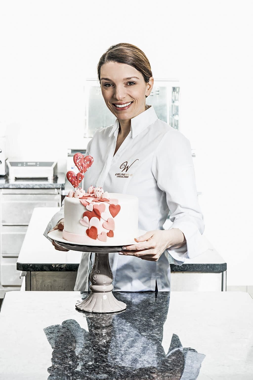 Eveline Wild with her Mother's Day cake 2019 which is flavoured with essential oil.