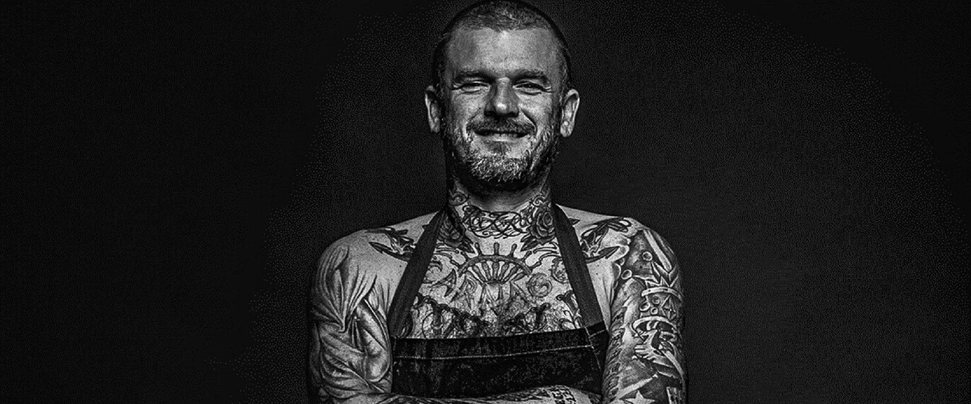 Matt Pritchard smilying cause he loves his job as a vegan chef