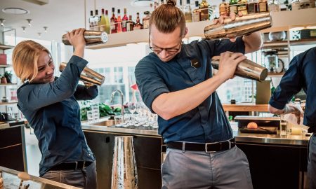 Skilled staff mixing Cocktails