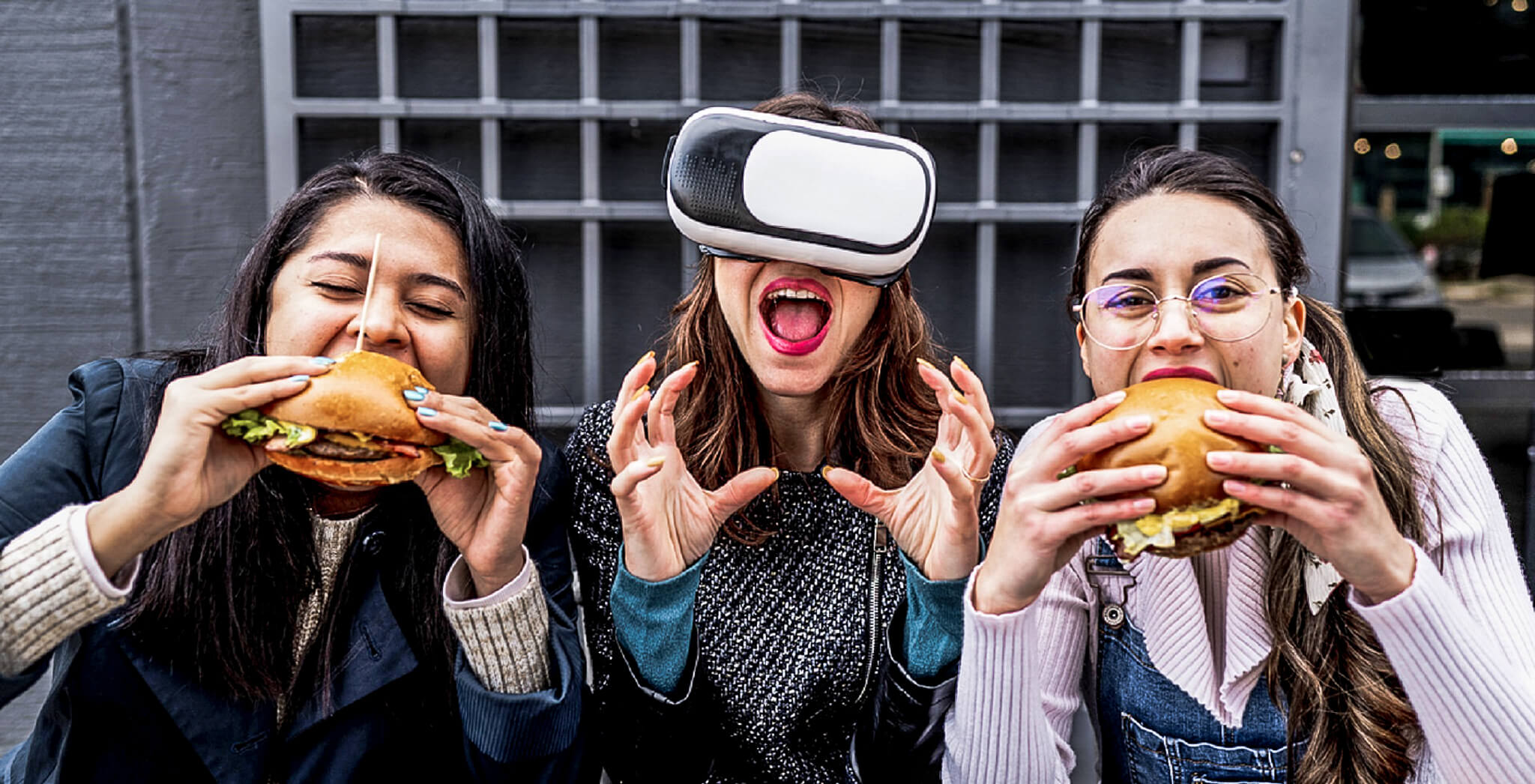 Group of young girls: Eating a real burger vs. a virtual one.