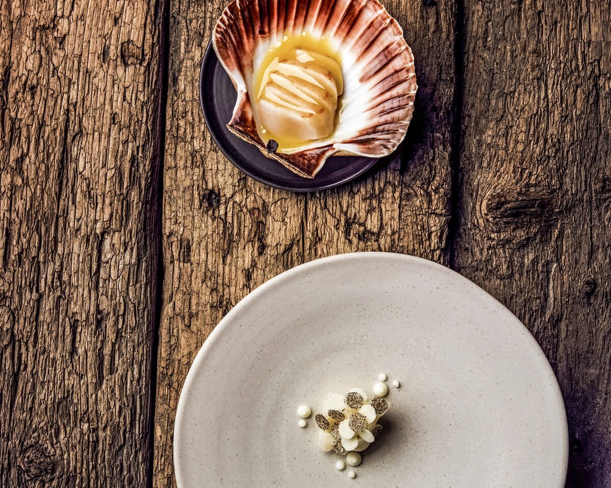 Scallops from the North with salted butter, preserved apple and smoked roe by Esben Holmboe.