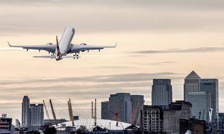 Air plane above a city