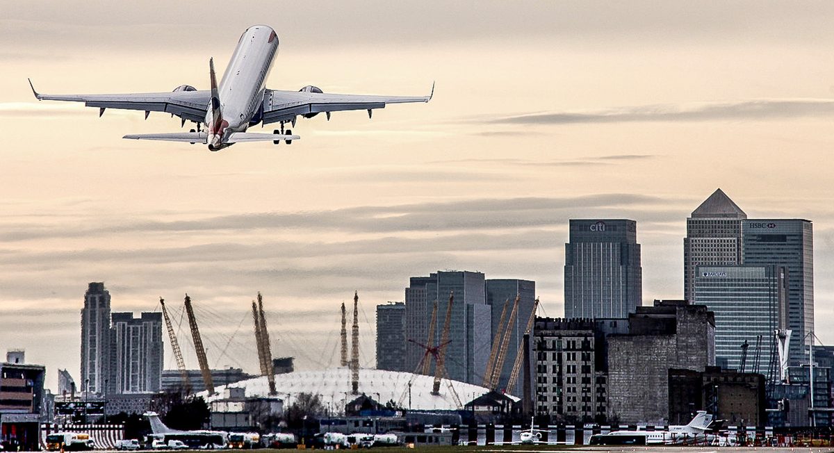 Air plane above a city