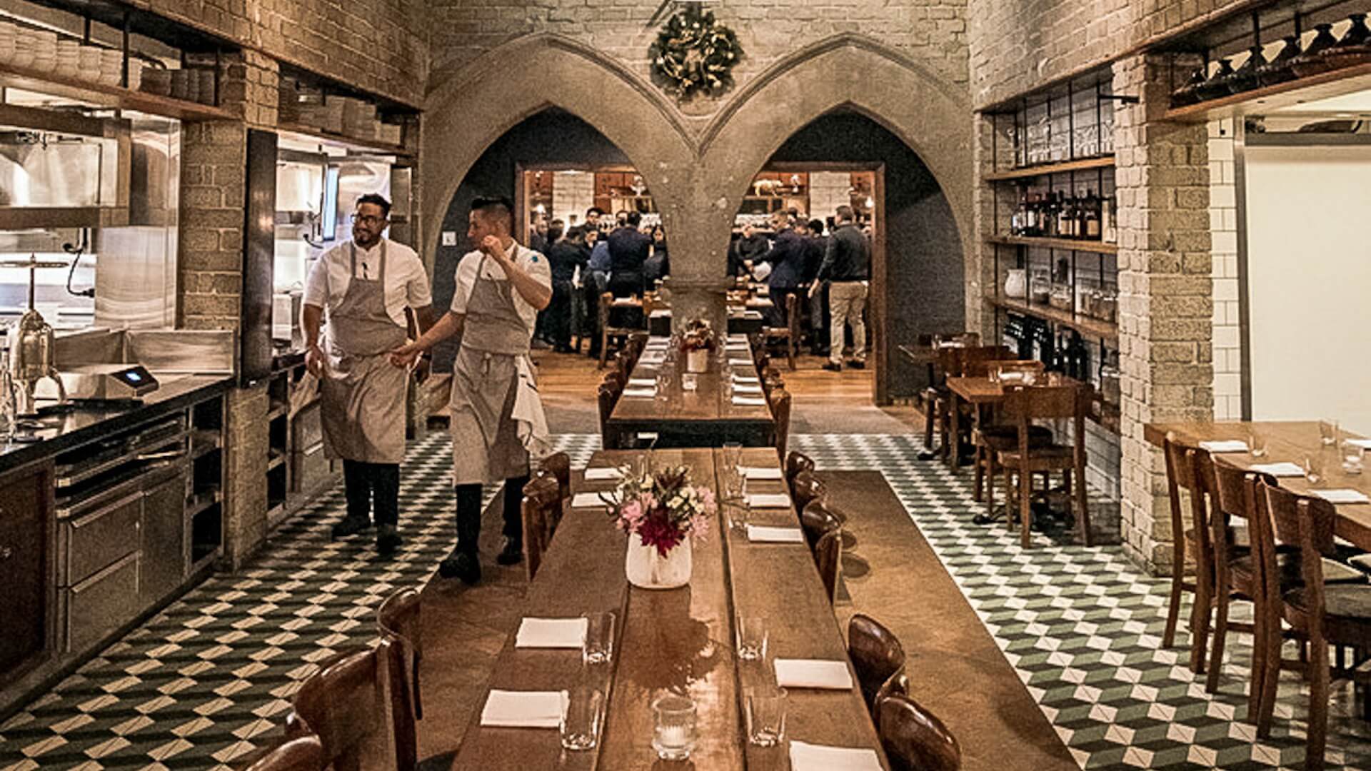 Shared table at the Republique - communal restaurant experience with friends and strangers