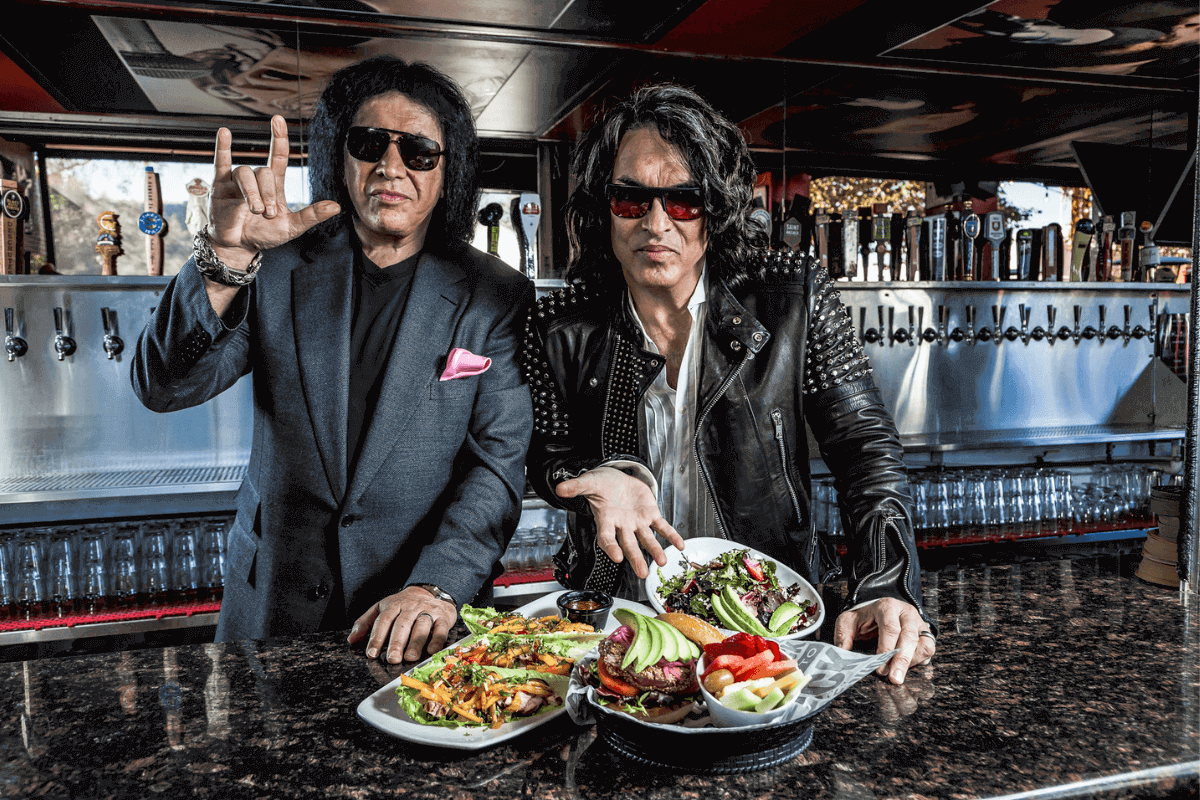 Gene and Paul in their restaurant with prepared food