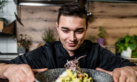 Dominik Suess looking at the perfectly presented plate. That's how you build up a regular clientele.