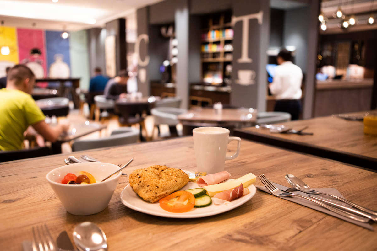 A laid table with a breakfast plate on it