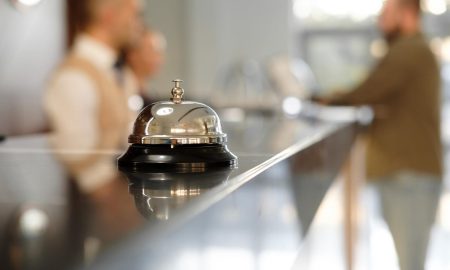 Hotel reception with a bell on the counter desk