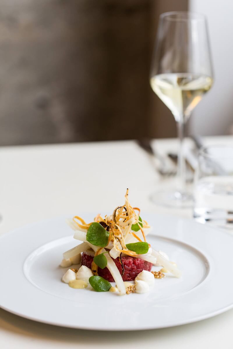 Beef tartare arranged on a plate
