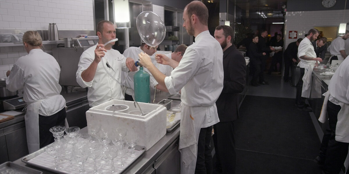 Chefs preparing Grant Achatz molecular cocktails