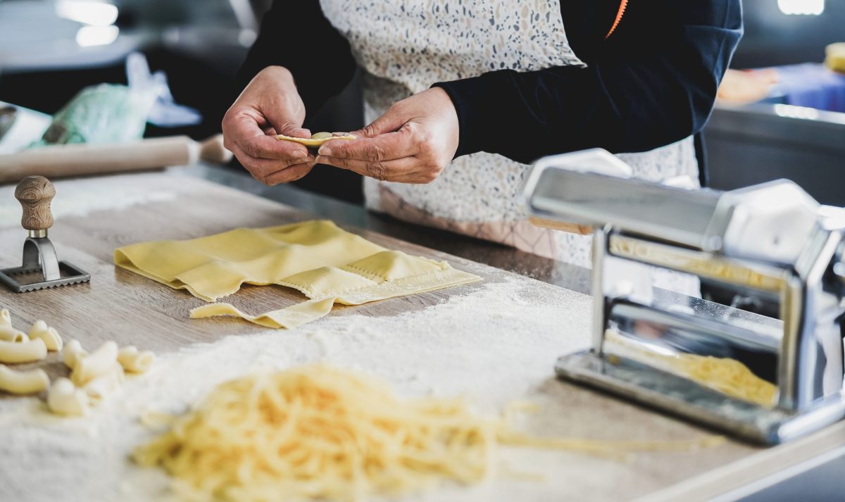 Making a lady's fresh ravioli