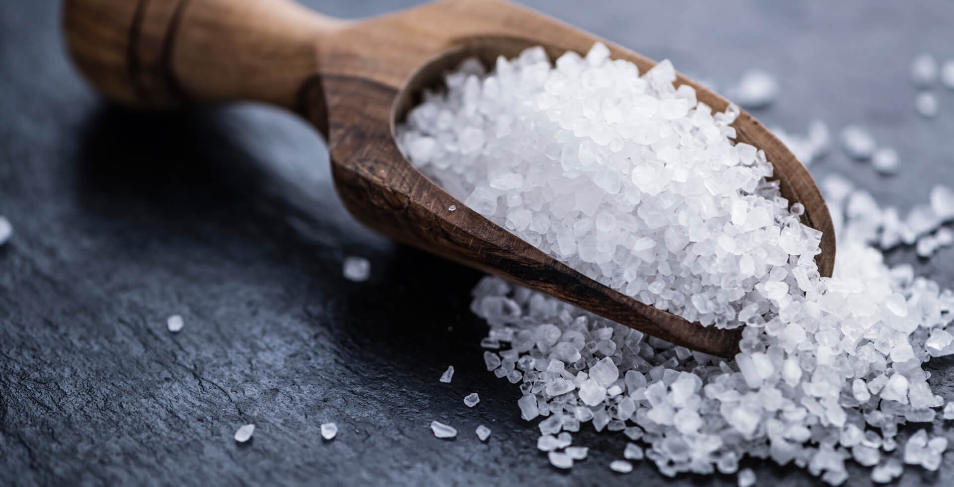Salt grains in salt scoop