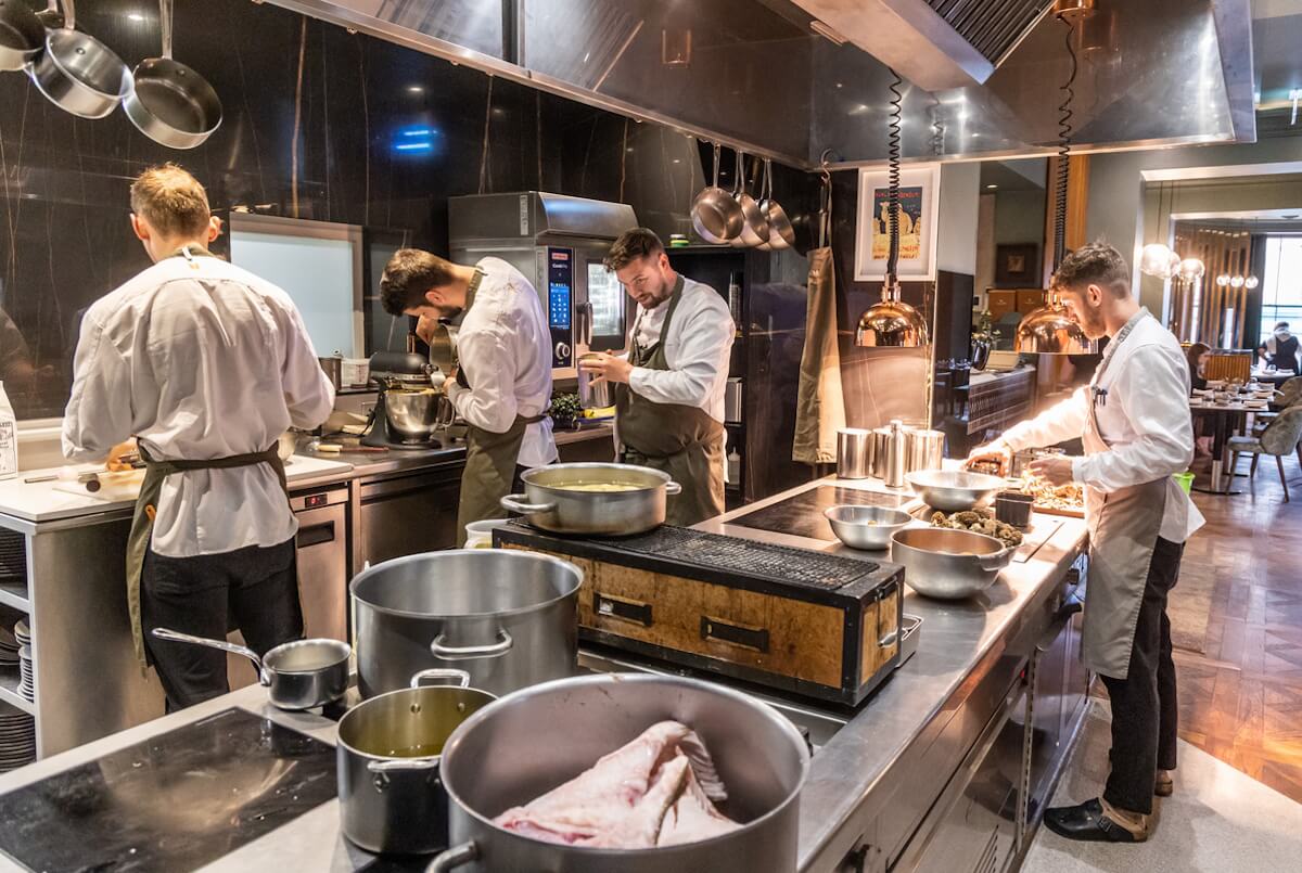 front kitchen in a restaurant in action